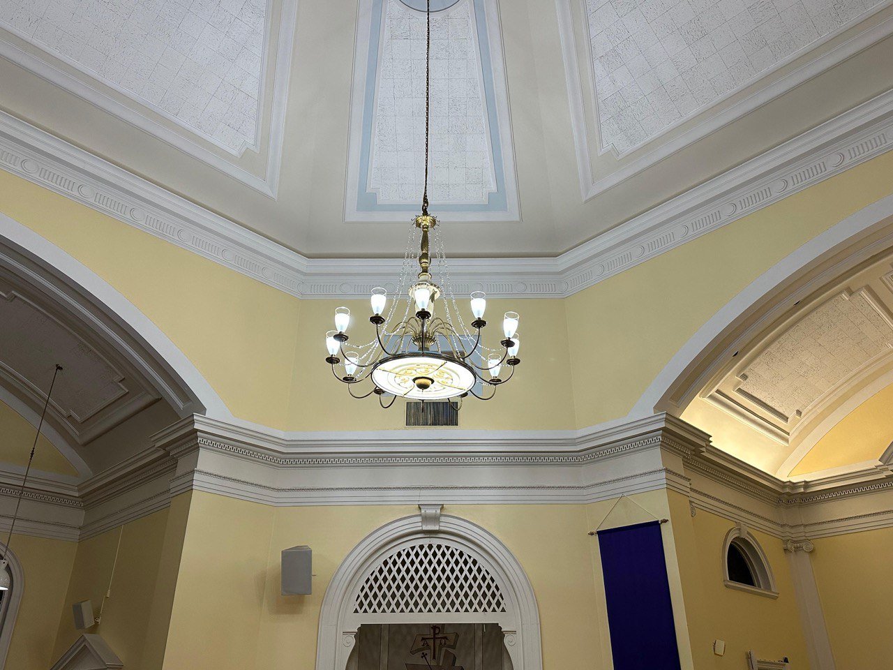 Elegant chandelier in a New York Building. Expert chandelier services available in New York Chandelier Services
