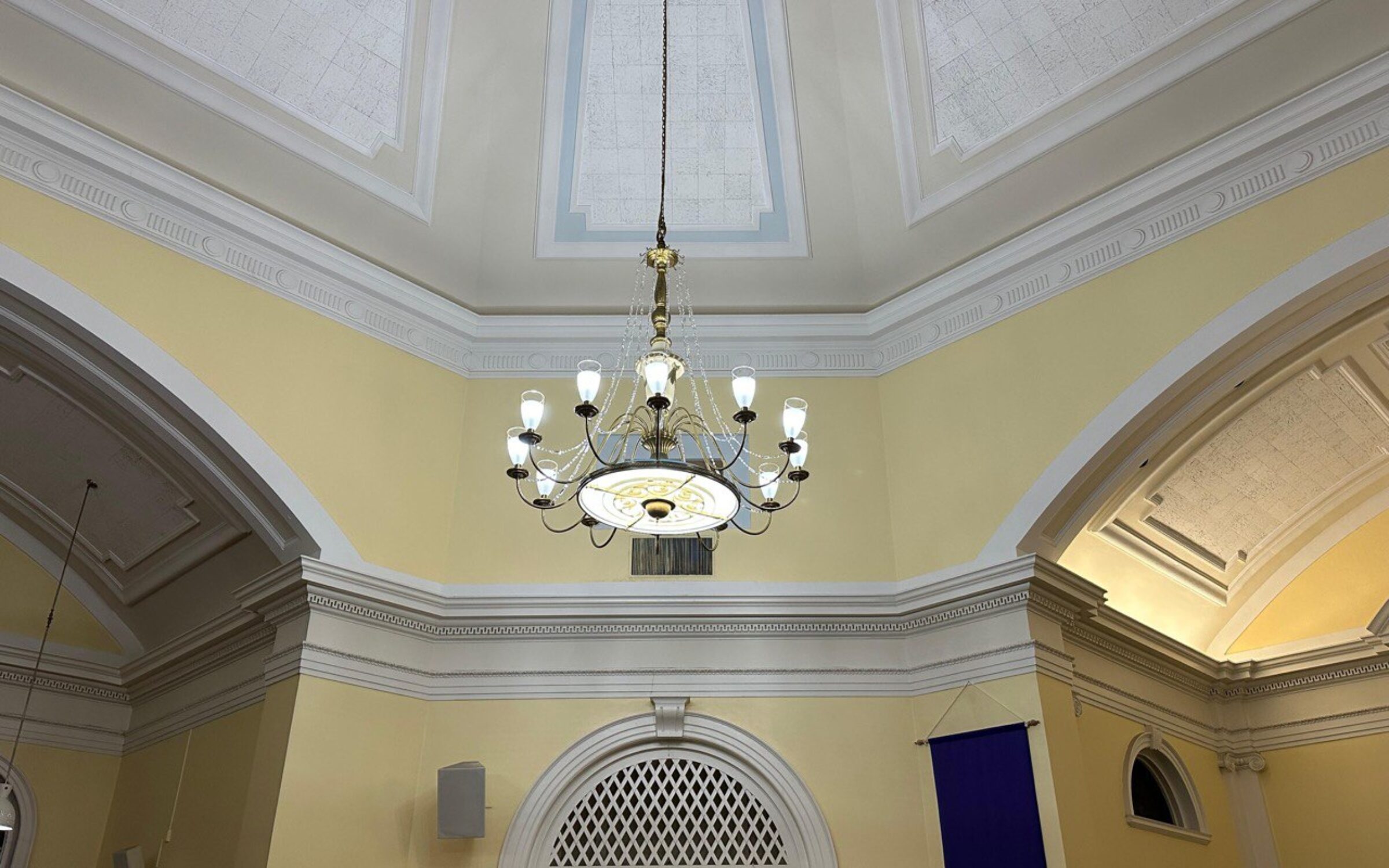 Elegant chandelier in a New York Building. Expert chandelier services available in New York Chandelier Services